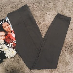 Athleta Stash Pocket Salutation Tight